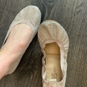 Gently worn pink ballerina flats